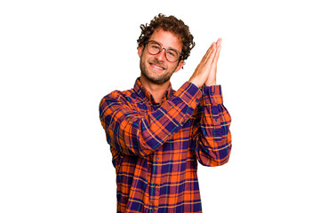 Young caucasian curly hair man isolated Young caucasian man with curly hair isolated feeling energetic and comfortable, rubbing hands confident.