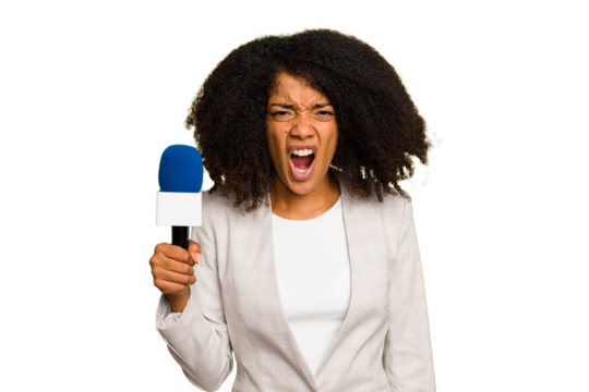 Young TV presenter African American woman with a microphone isolated screaming very angry and aggressive.