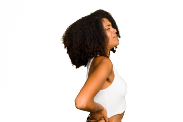 Young African American woman isolated suffering a back pain.