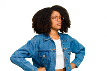 Young African American woman isolated frowning face in displeasure, keeps arms folded.