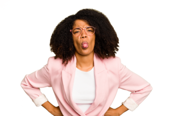 Young African American woman isolated funny and friendly sticking out tongue.