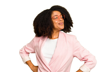 Young African American woman isolated dreaming of achieving goals and purposes