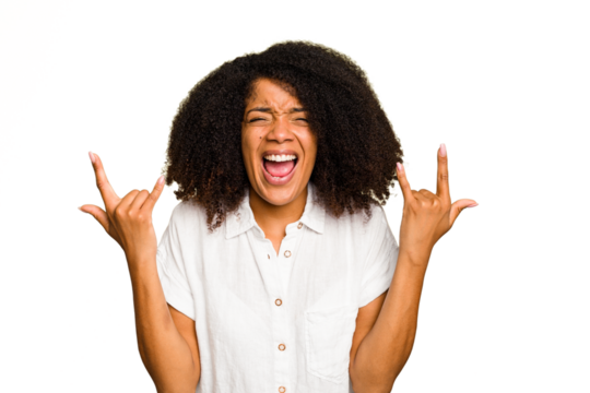 Young African American woman isolated showing a horns gesture as a revolution concept.