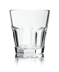 Empty glass for whiskey on white background.