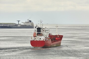 Fototapeta premium Industrial ships sailing near Rotterdam