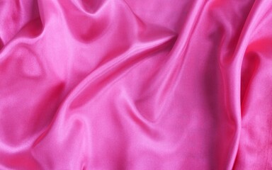 Beautiful bright pink fabric, folded in soft folds. Silk, satin or satin ribbon.