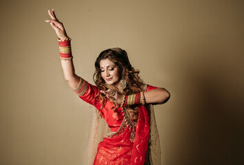 Color portrait of an indian kathak dancer moving hands 