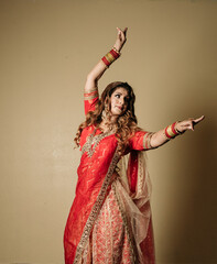 Color portrait of Indian dancer moving hands