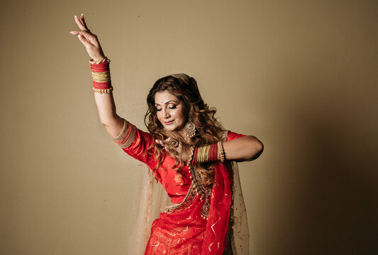 Color portrait of an indian kathak dancer moving hands 