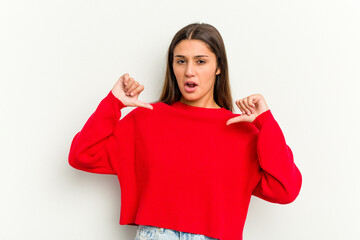 Young Indian woman isolated on white background feels proud and self confident, example to follow.