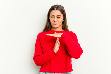 Fototapeta premium Young Indian woman isolated on white background showing a timeout gesture.