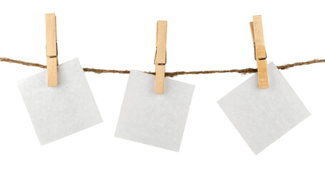 Paper hanging on clothesline with clipping path