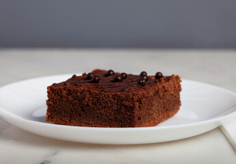 Browny Cake on a White Plate