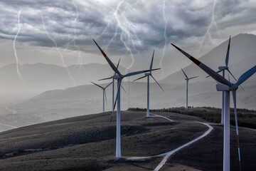 Wind turbines on a beautiful sky.A mountain wind farm in Italy. Renewable energy concept, green...