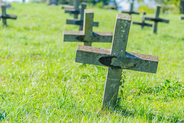 The old military cemetery at Tranžament, Petrovaradin. A panoramic view of the old identical, neglected concrete gravestone crosses of the military cemetery.