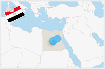 Map of Egypt with a pinned blue pin. Pinned flag of Egypt.
