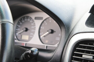The panel and controls of the car against the background of the blurred dashboard