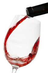 Red wine pouring in glass isolated on white background