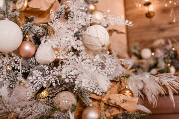 ball-decorated Christmas tree branches indoors.