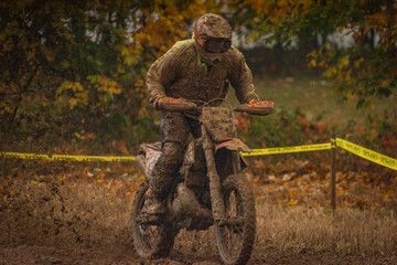 Dirty championship in sludge autumn day on motorbike near Vysoke nad Jizerou
