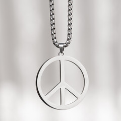 Metal peace symbol necklace medallion on a white. - 539012784