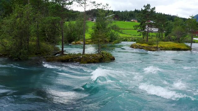 Stryn village and blue lake, beautiful nature of Norway lakes and mountains, Aerial