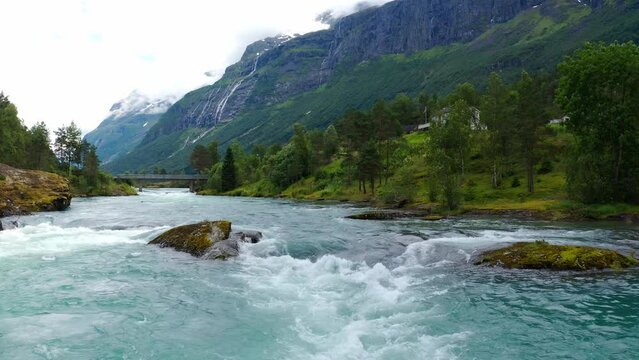 Stryn village and blue lake, beautiful nature of Norway lakes and mountains, Aerial