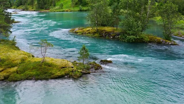 Stryn village and blue lake, beautiful nature of Norway lakes and mountains, Aerial