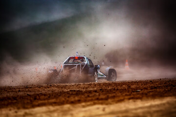 Racing sports car in dust clubs on the track , rally	
