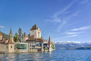 View of the famous Oberhofen castle on the shore of Lake Thun