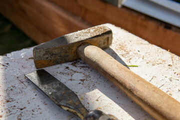 hammer and chisel resin for woodworking needed for timber construction, tools used for construction work on wood