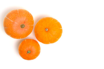 Three pumpkins white background, top view.