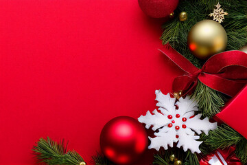 christmas background with red balls and fir branches gift and present boxes