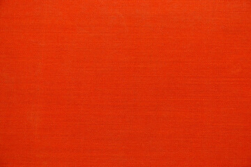 Abstract background, orange fabric texture.