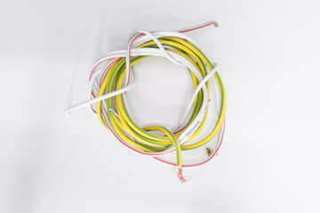 copper wires wound together yellow and white