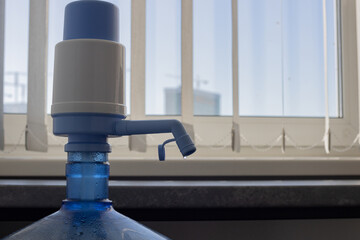 Water bottles pump blue manual hand pressure drinking. Water pump for home and office. Water...
