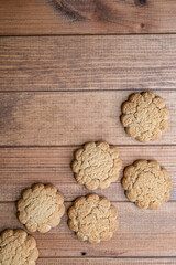 fresh oatmeal cookies on a wooden background, confectionery.