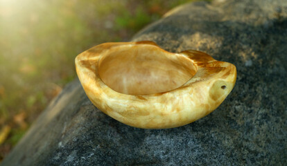 Production of a wooden mug made of birch bark. Wood carving. A wooden piece made of wood with your own hands.