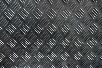 Photo of the texture of the aluminum floor surface. Covering the floor in the car with iron sheets. Sheet metal for the room.