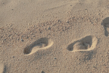 Fototapeta na wymiar footprints in sand