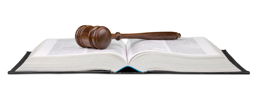 Wooden judge hammer with book. Justice and law concept