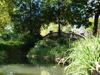 Fototapeta na wymiar romantic garden bridge