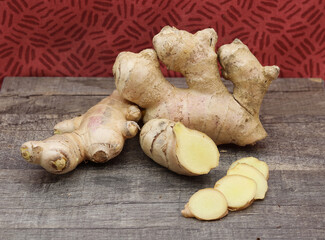 Ginger root on wooden background