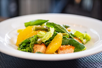 salad with orange, asparagus and salmon