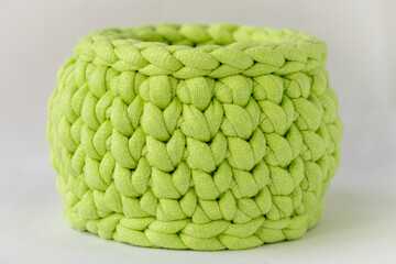 crocheted light green basket, stuff organizer, crochet baskets bottom, pattern for crocheting, nature-friendly sustainable handicraft business, cute interior items. Space for your text