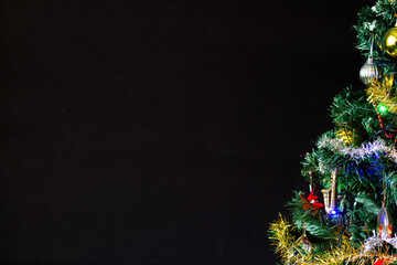 Christmas tree at a black background
