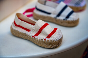 Traditional Spanish shoes for summer, espadrilles, make from soft fabric for baby, children and adults.