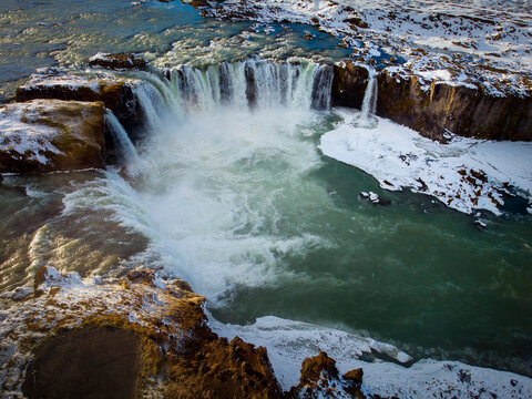 Aerial image of Godafoss waterfall in winter. This beautifull waterfall is located in the North of Iceland.