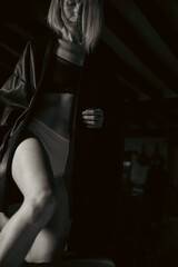 woman 42 years old in underwear, b/w, depression theme
