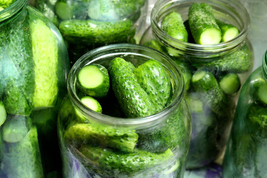 Many Pickling Jars With Fresh Cucumbers, Closeup